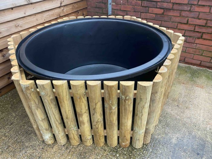 wooden hexagonal frame with rigid round preformed pond liner 1000 litres assembled